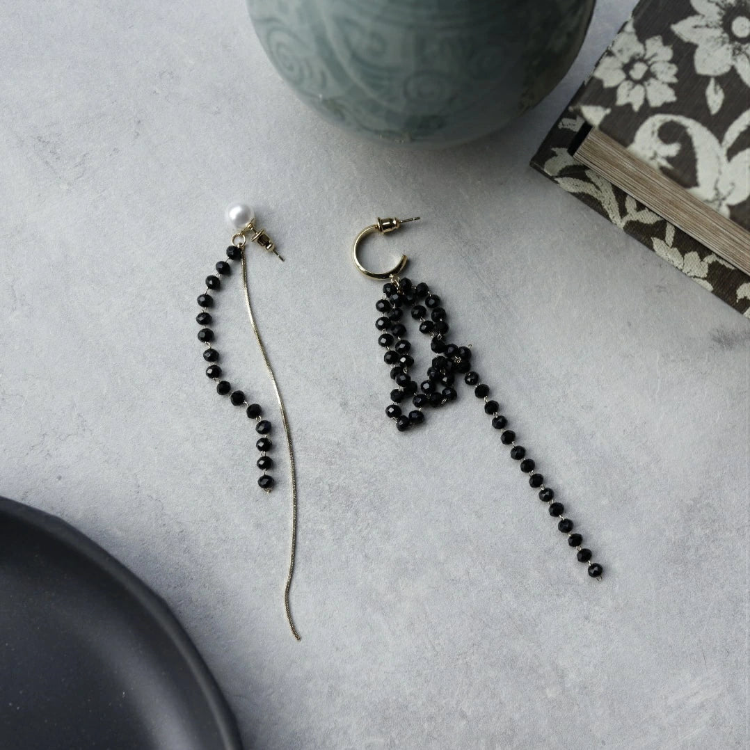 P104 asymmetry beads long pierce