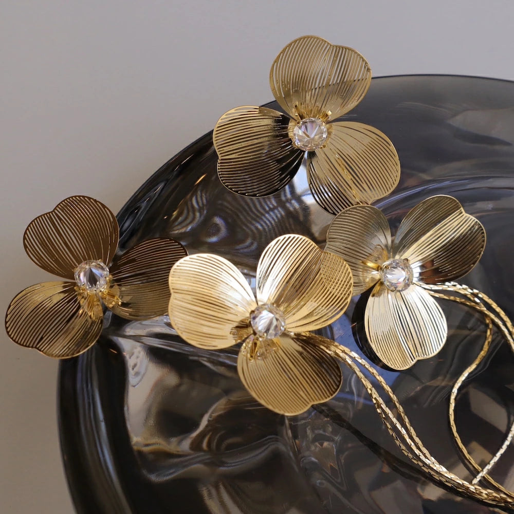 P416 oversized gold flower pierce