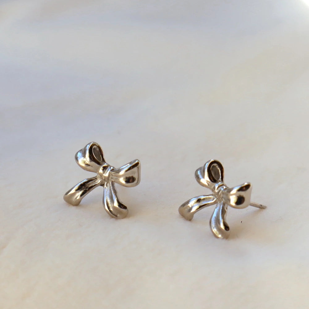 P380 stainless ribbon motif pierce