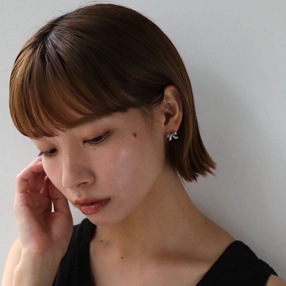 P380 stainless ribbon motif pierce