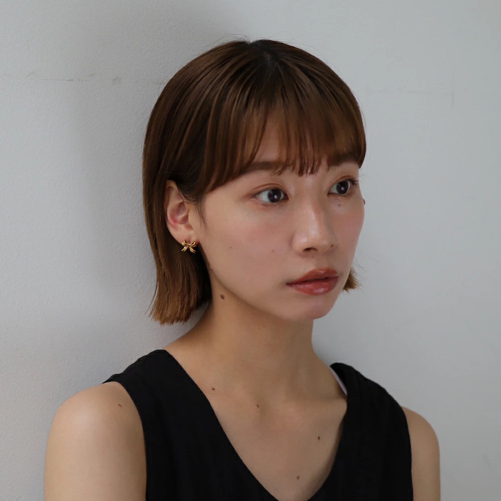 P380 stainless ribbon motif pierce