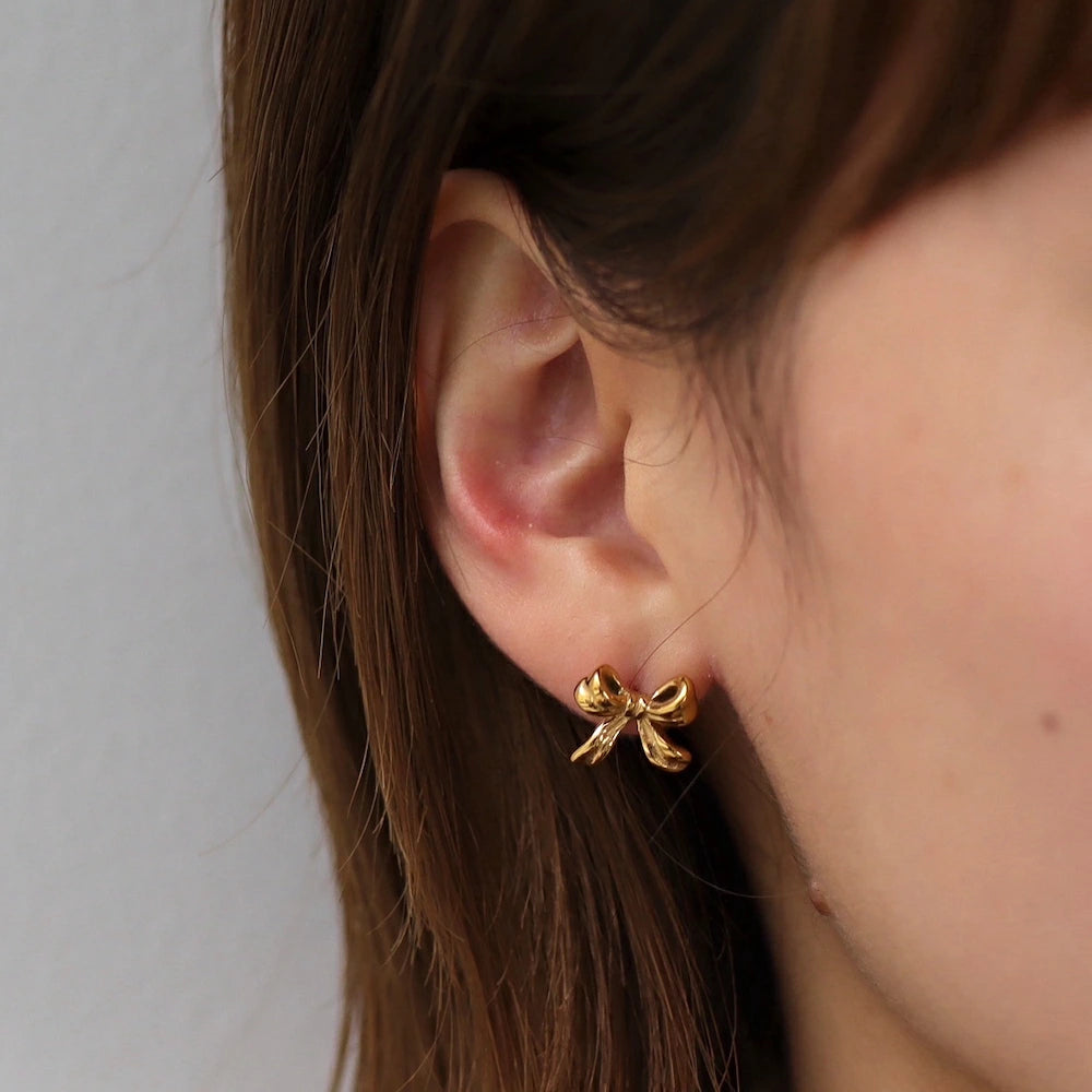 P380 stainless ribbon motif pierce