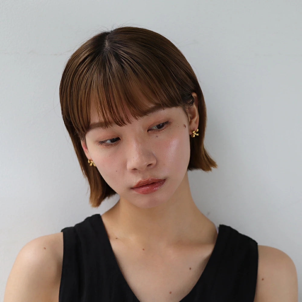 P380 stainless ribbon motif pierce