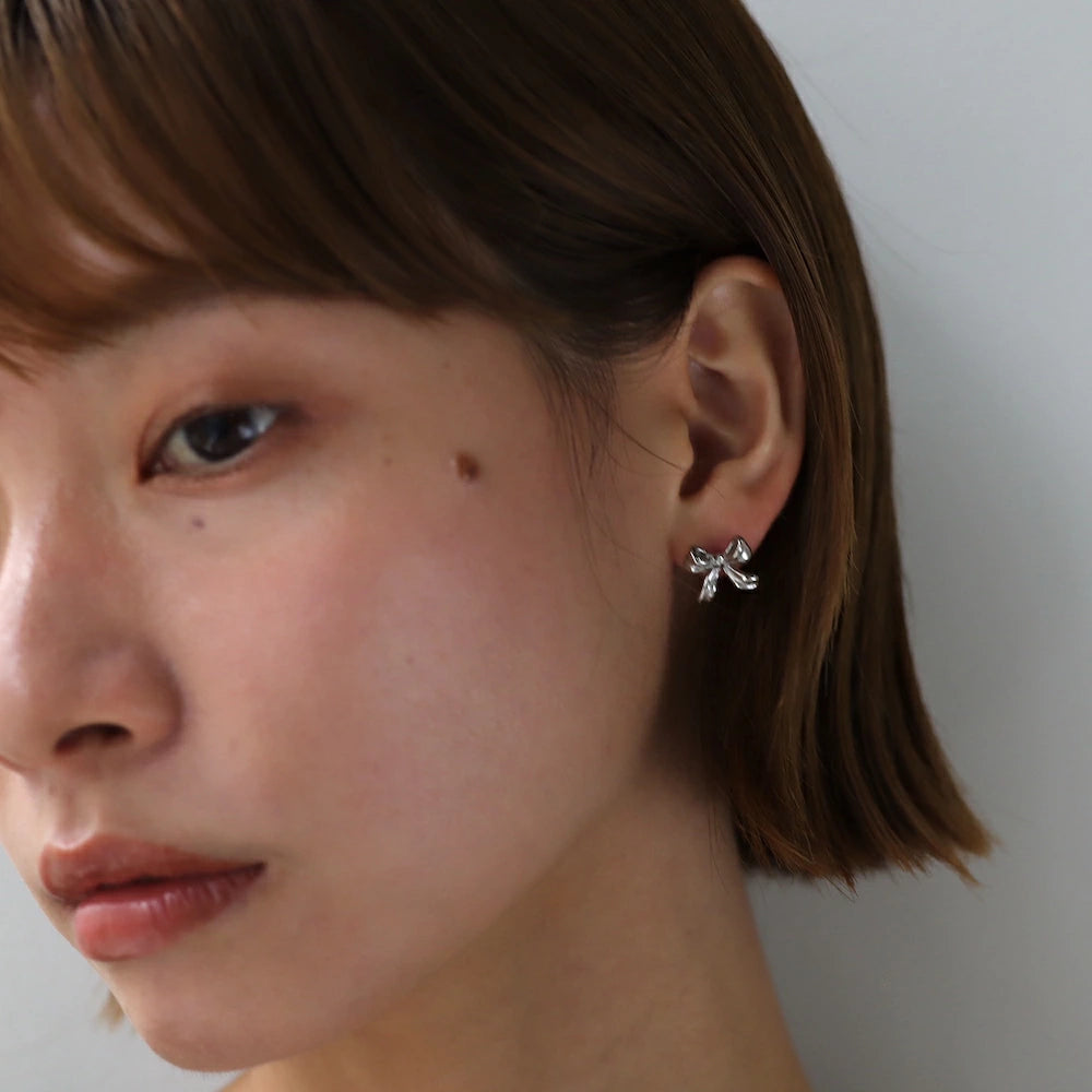 P380 stainless ribbon motif pierce
