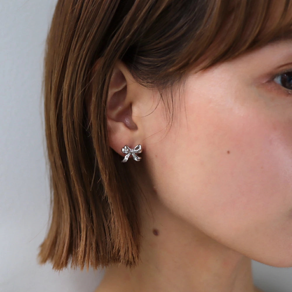 P380 stainless ribbon motif pierce