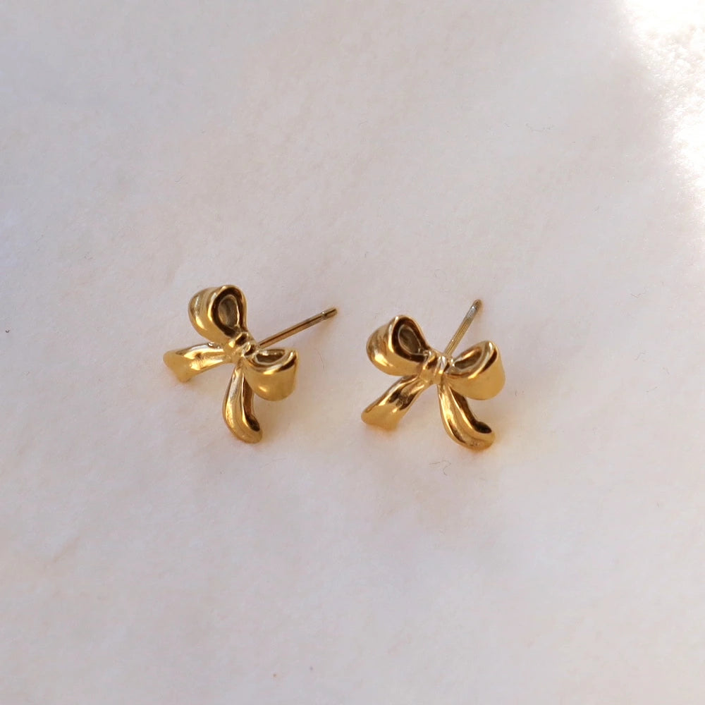 P380 stainless ribbon motif pierce