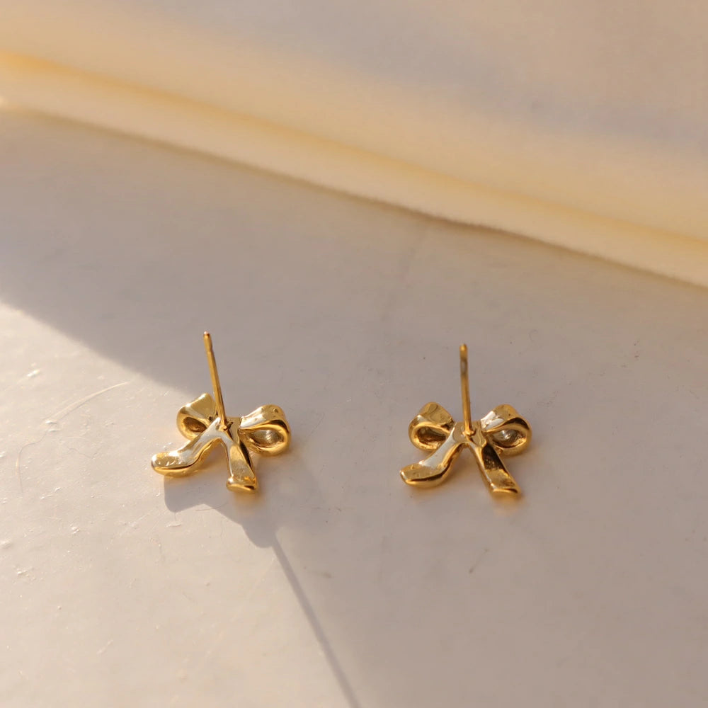 P380 stainless ribbon motif pierce