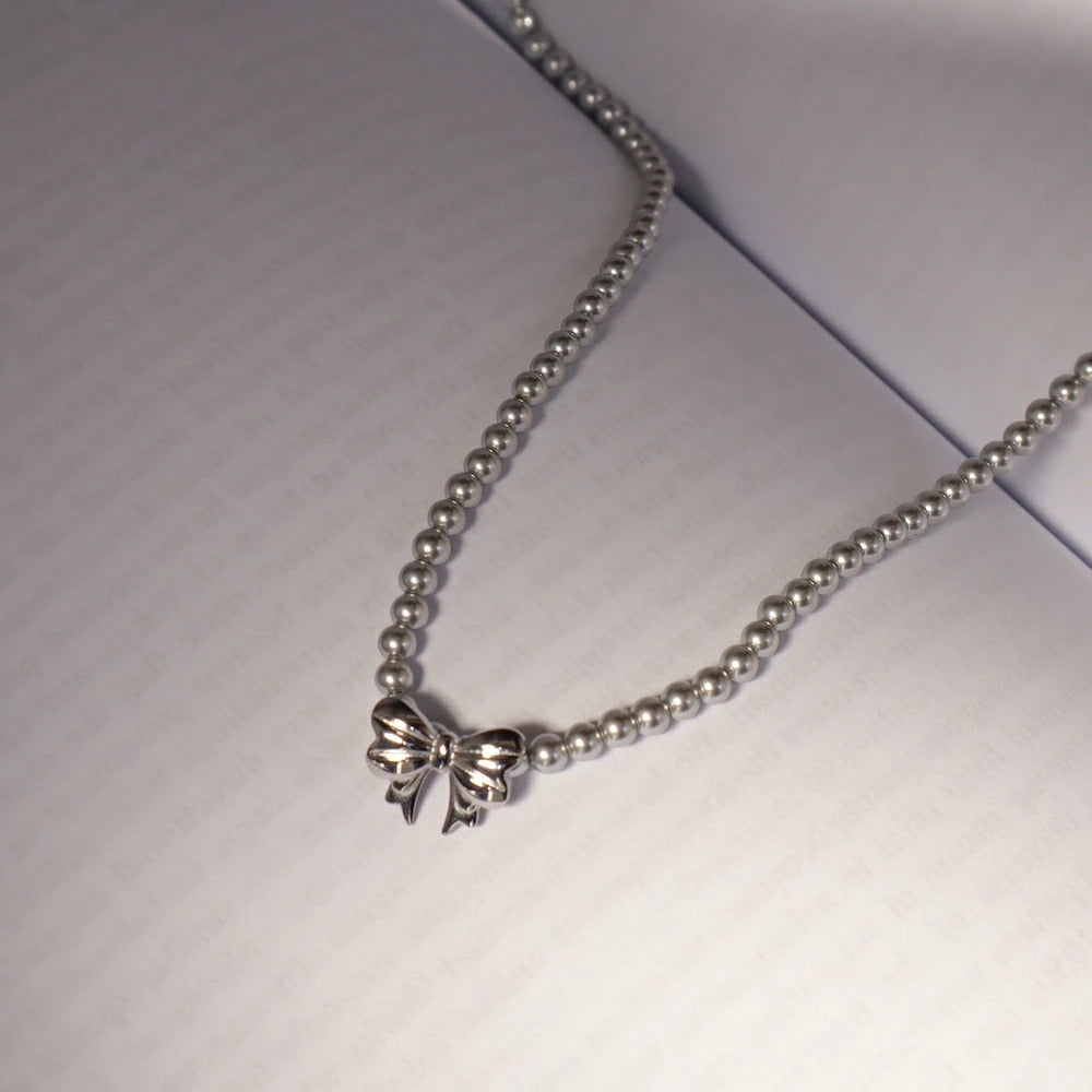 N239 stainless silver ribbon pearl necklace