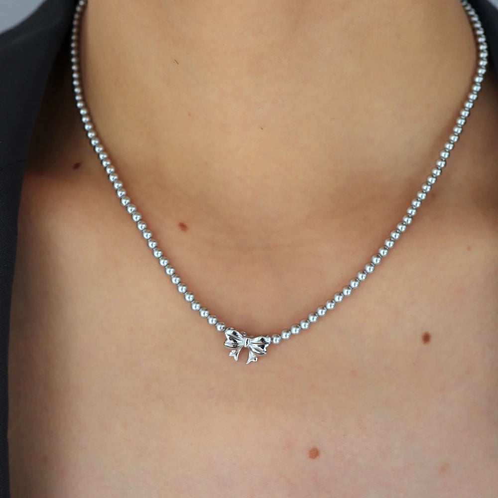 N239 stainless silver ribbon pearl necklace