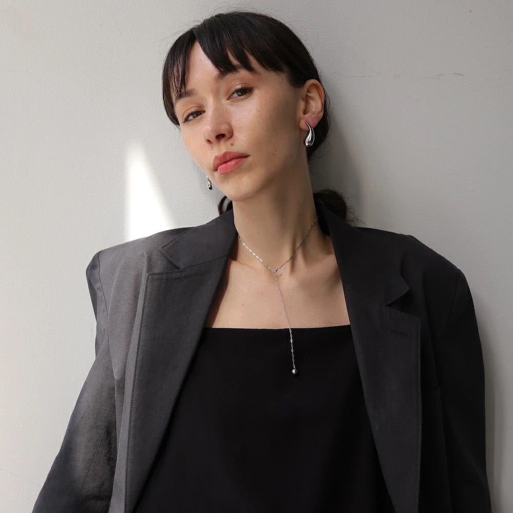N042 stainless cut ball lariat necklace