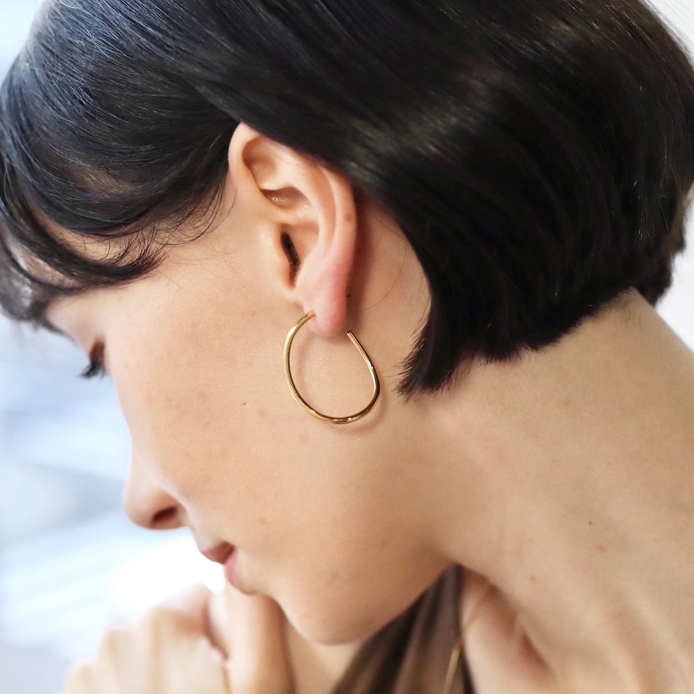 P038 stainless soft wave hoop pierce