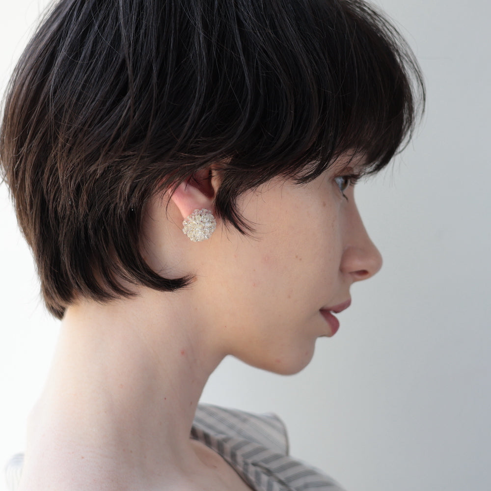 P209 clear flower bead pierce