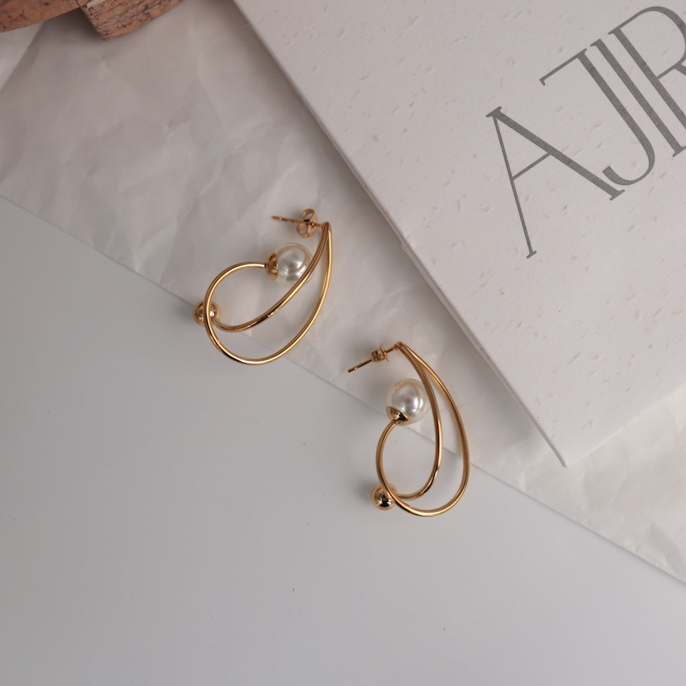 P474 stainless pearl hoop pierce