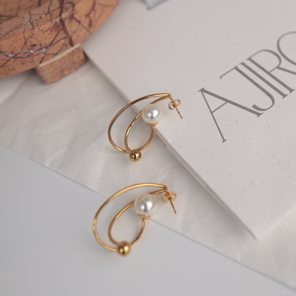 P474 stainless pearl hoop pierce