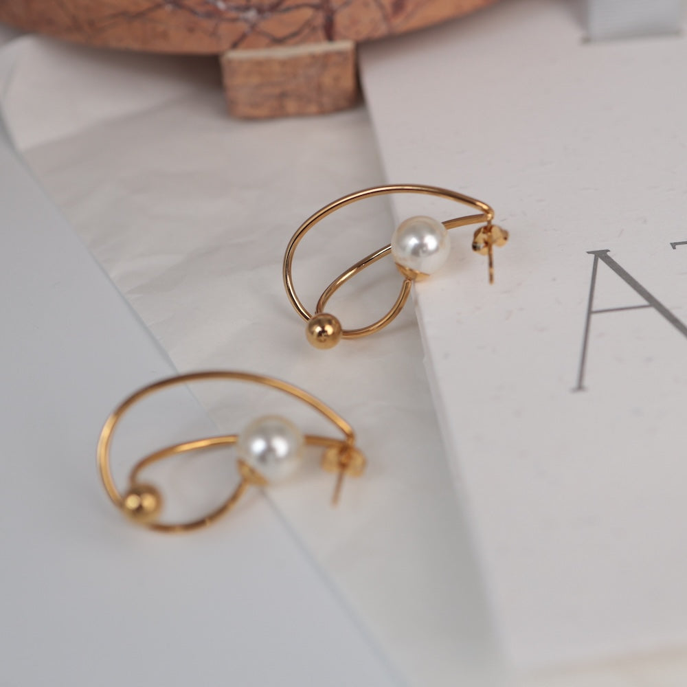 P474 stainless pearl hoop pierce