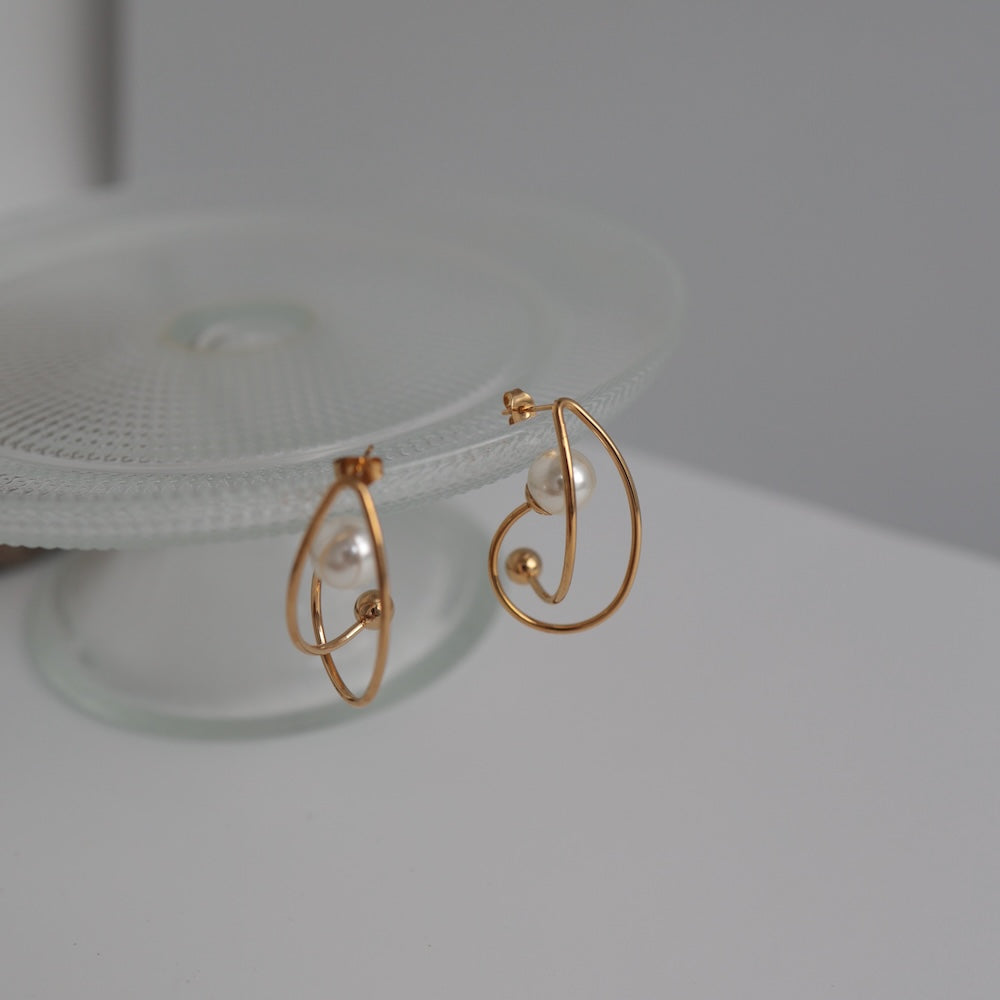 P474 stainless pearl hoop pierce