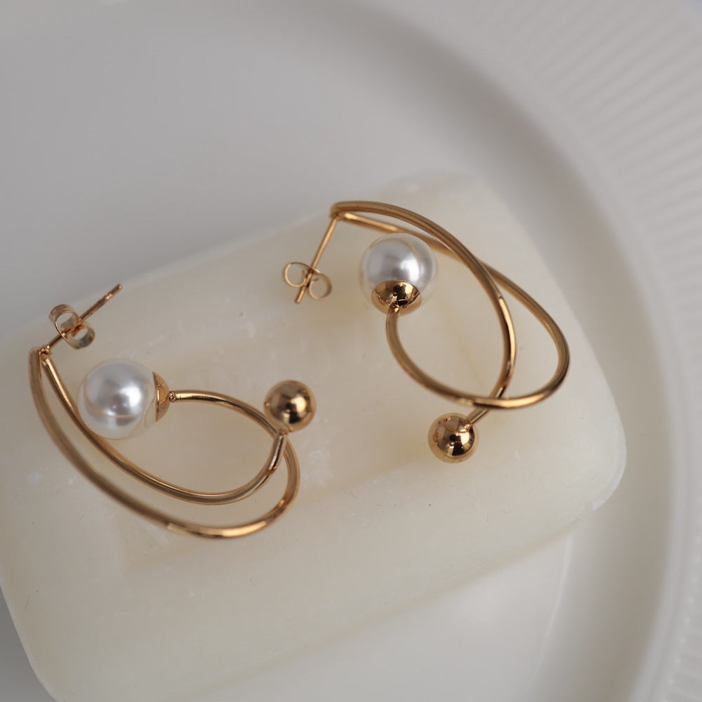 P474 stainless pearl hoop pierce