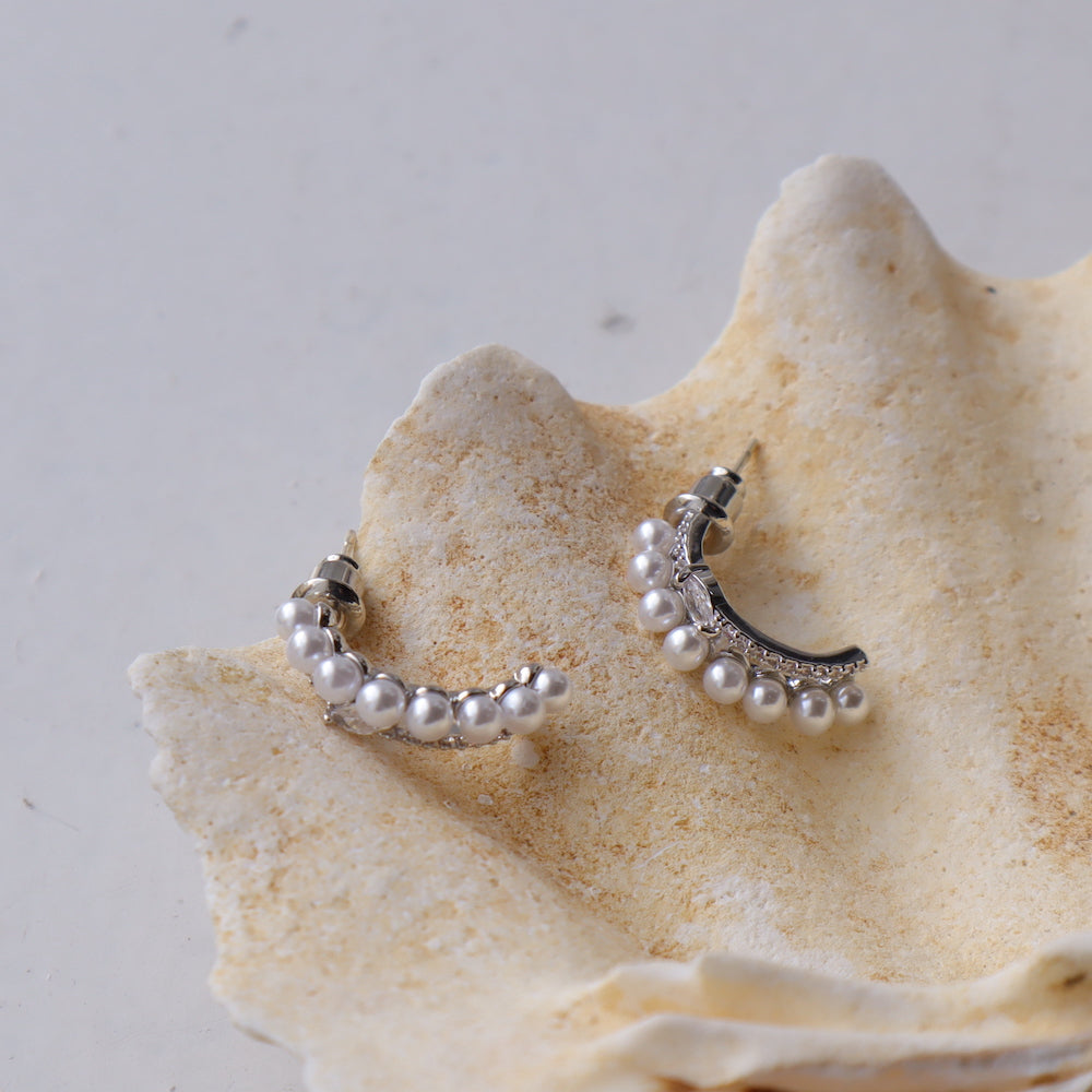 P134 zirconia and pearl half foop pierce