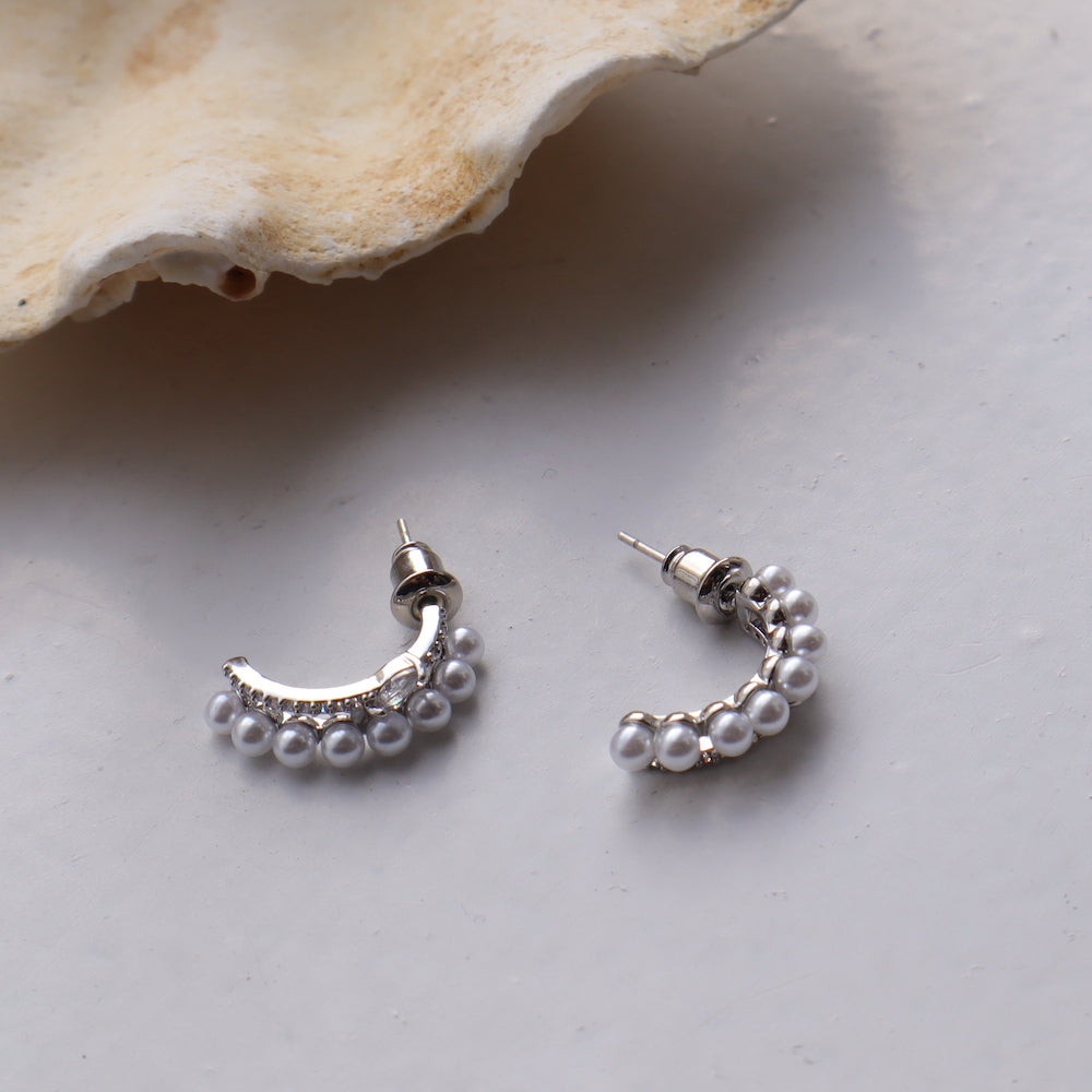 P134 zirconia and pearl half foop pierce