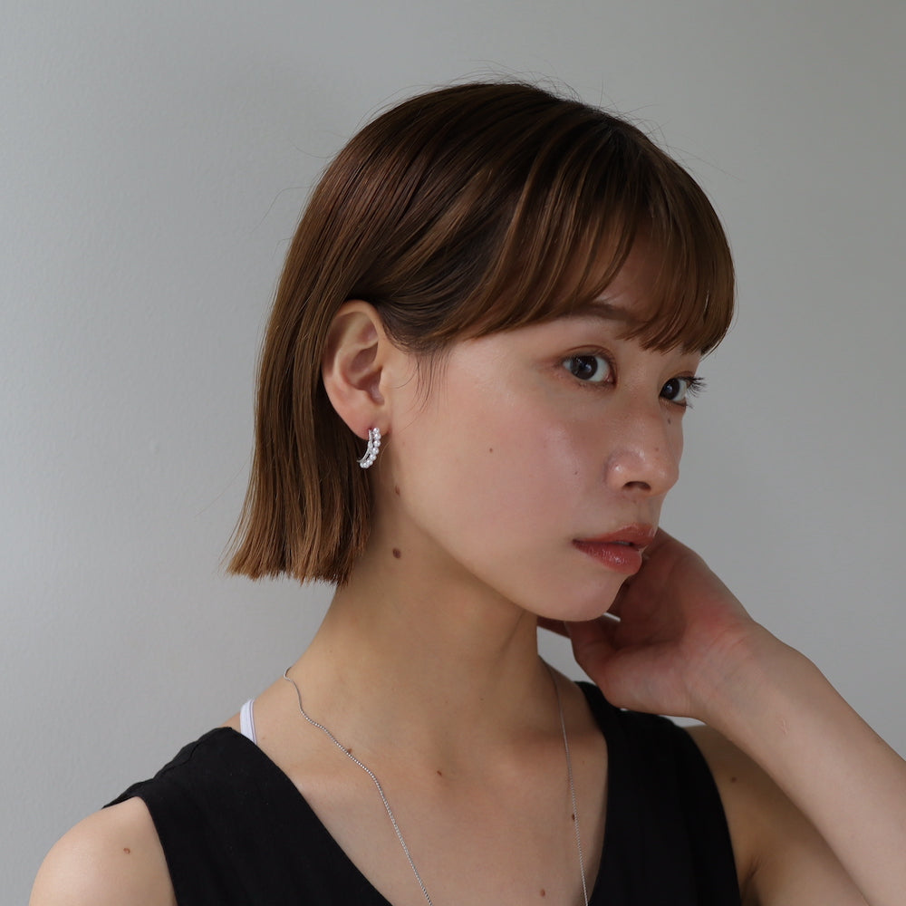 P134 zirconia and pearl half foop pierce