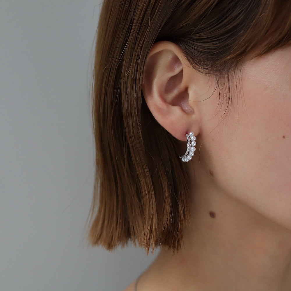 P134 zirconia and pearl half foop pierce