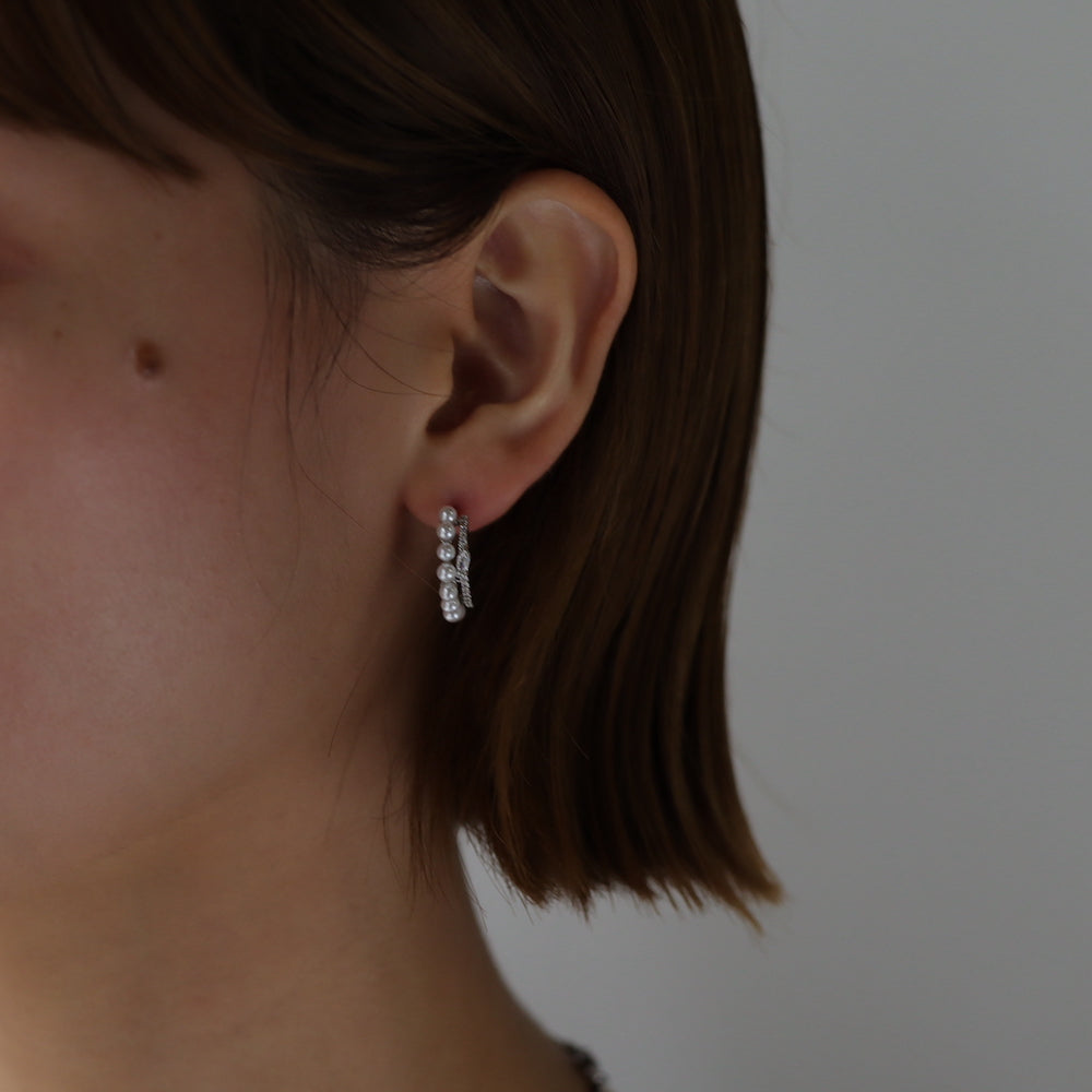 P134 zirconia and pearl half foop pierce