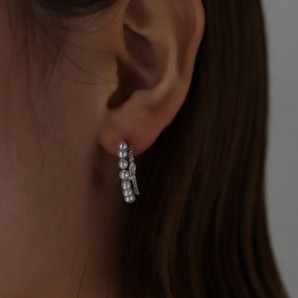 P134 zirconia and pearl half foop pierce