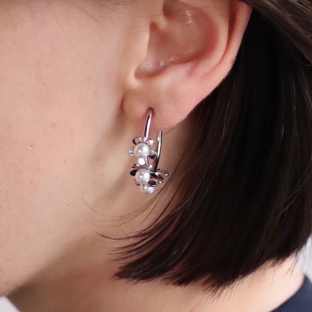 P198 stainless pearl flower pierce