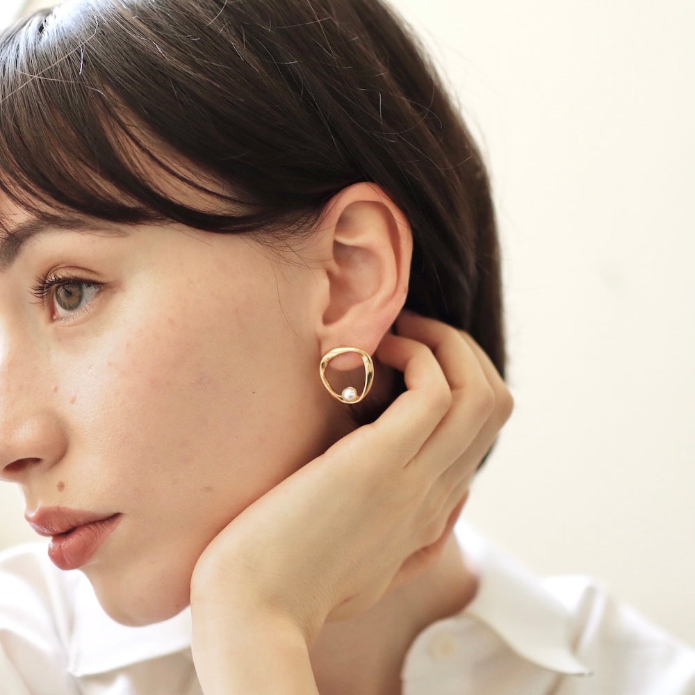 P266 stainless circle one pearl pierce