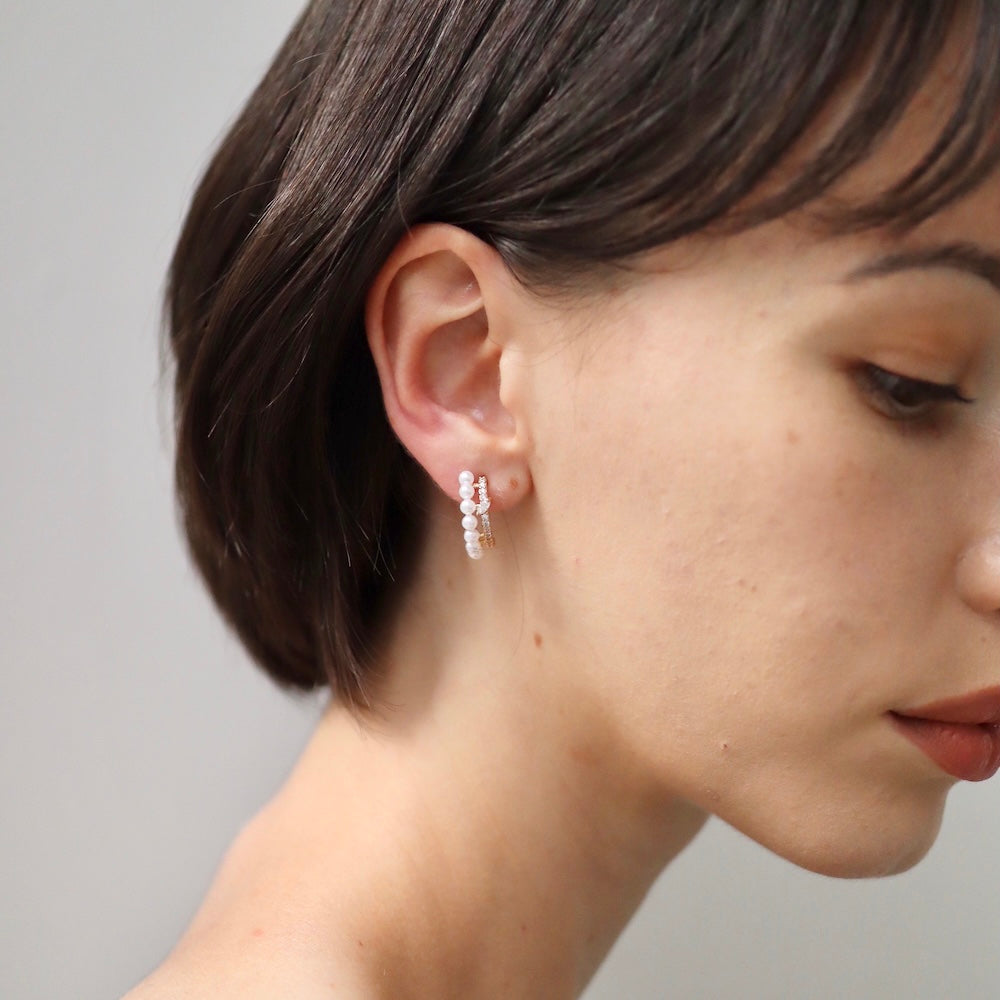 P134 zirconia and pearl half foop pierce
