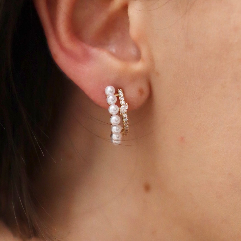 P134 zirconia and pearl half foop pierce