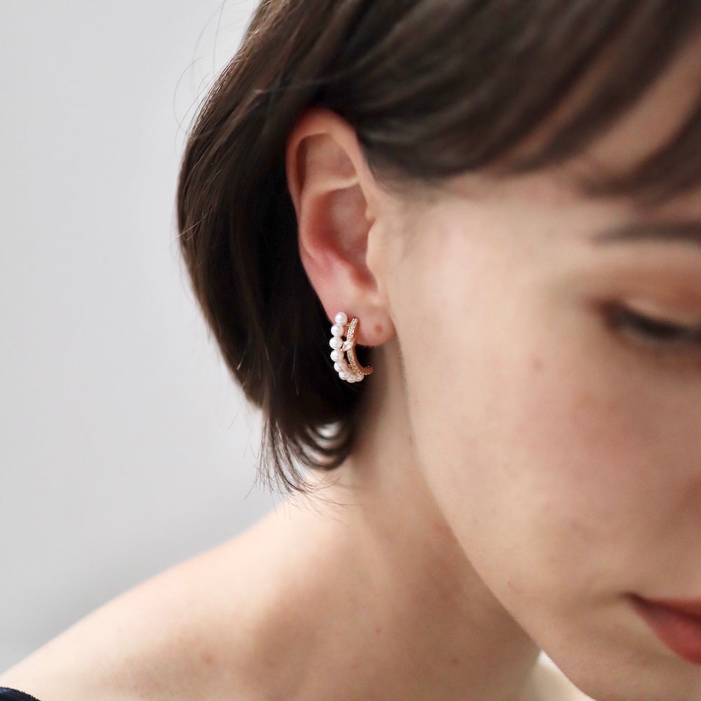 P134 zirconia and pearl half foop pierce