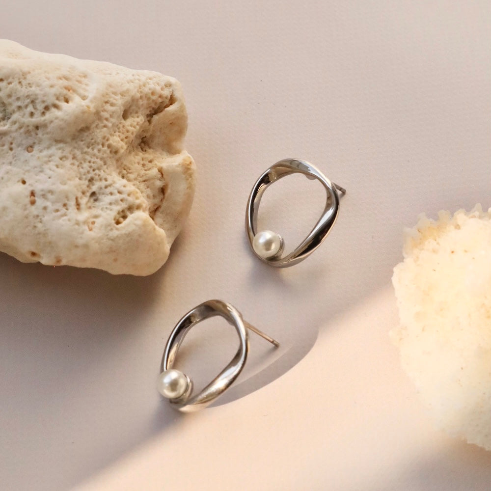 P266 stainless circle one pearl pierce