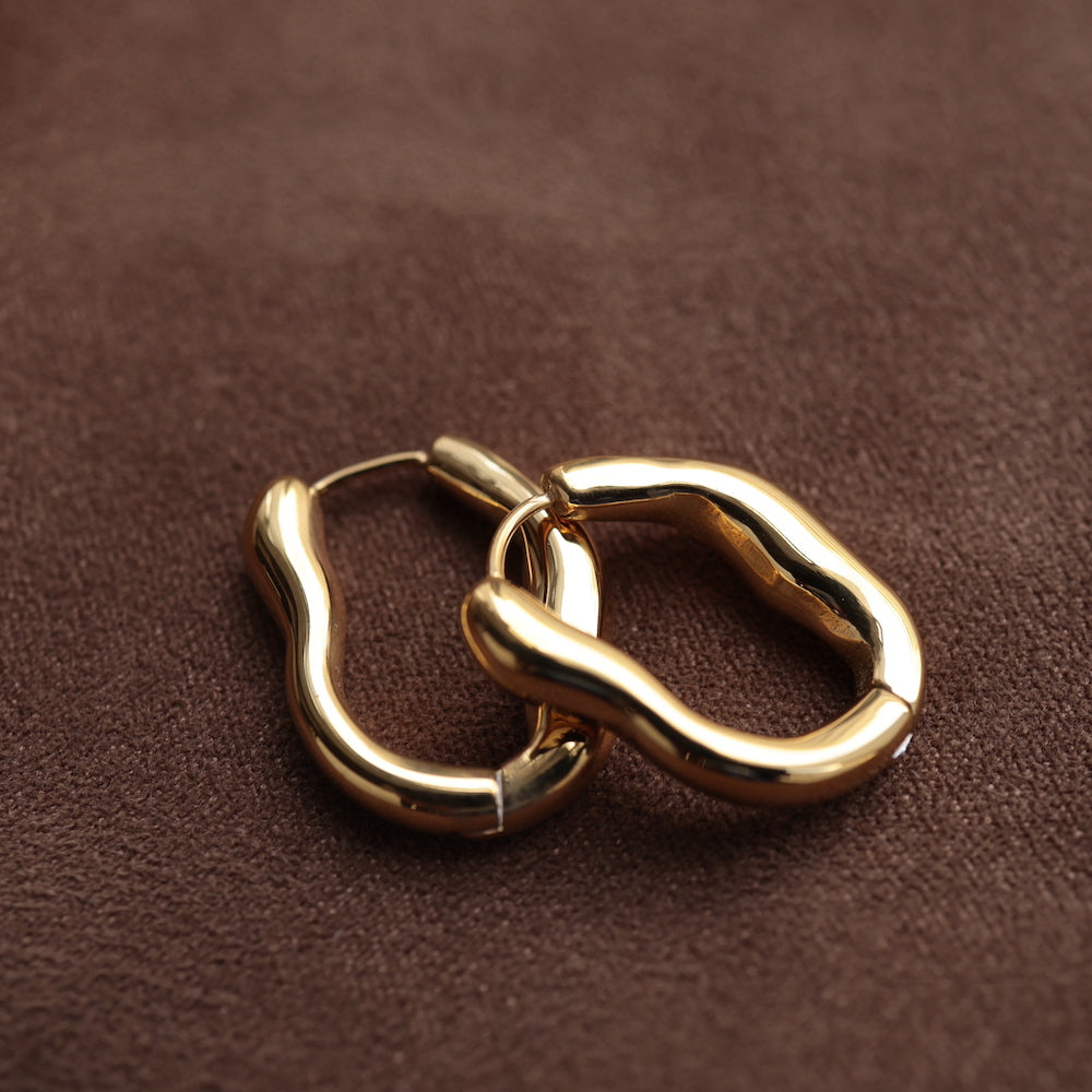 P278 stainless wave hoop pierce