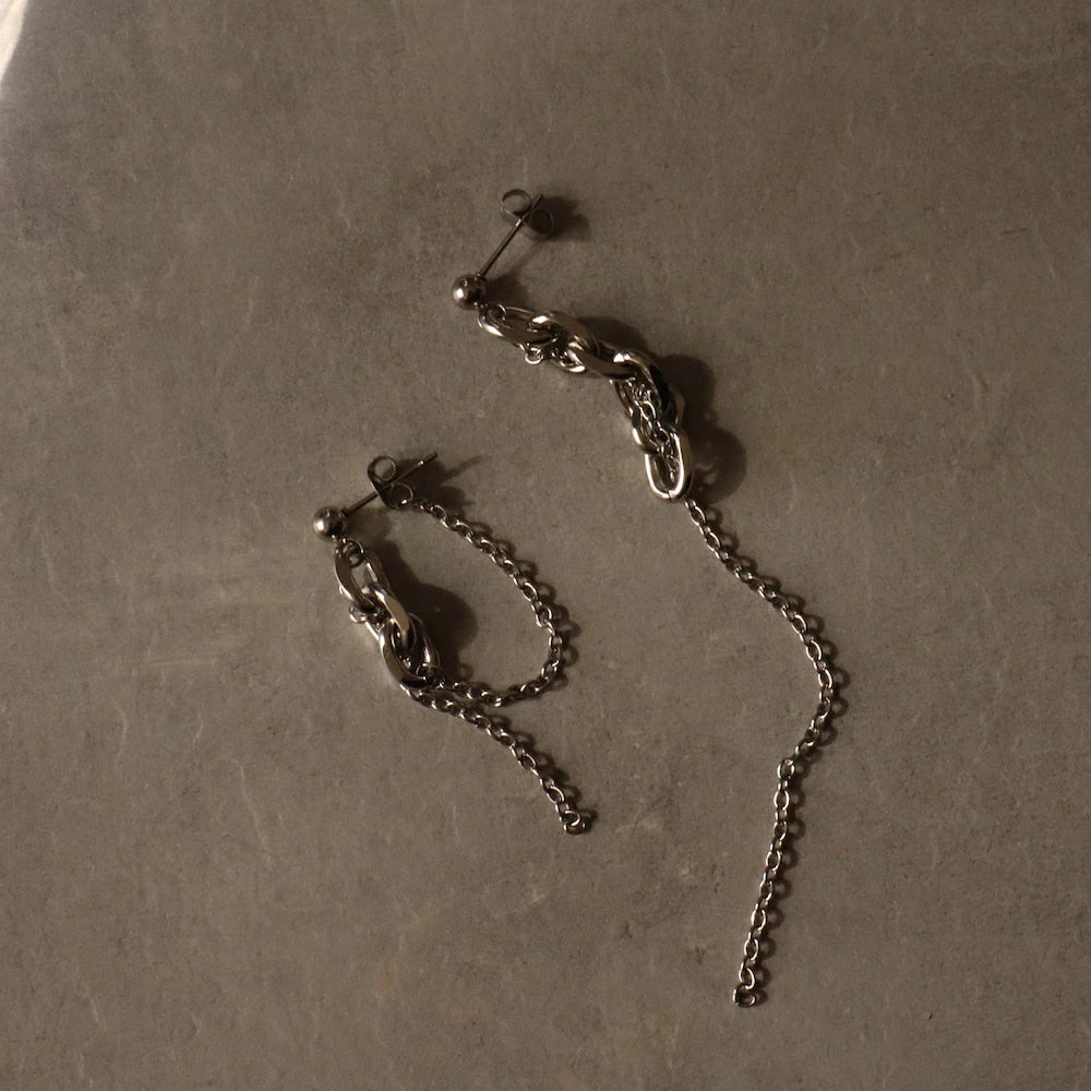 P143  stainless asymmetry long chain pierce