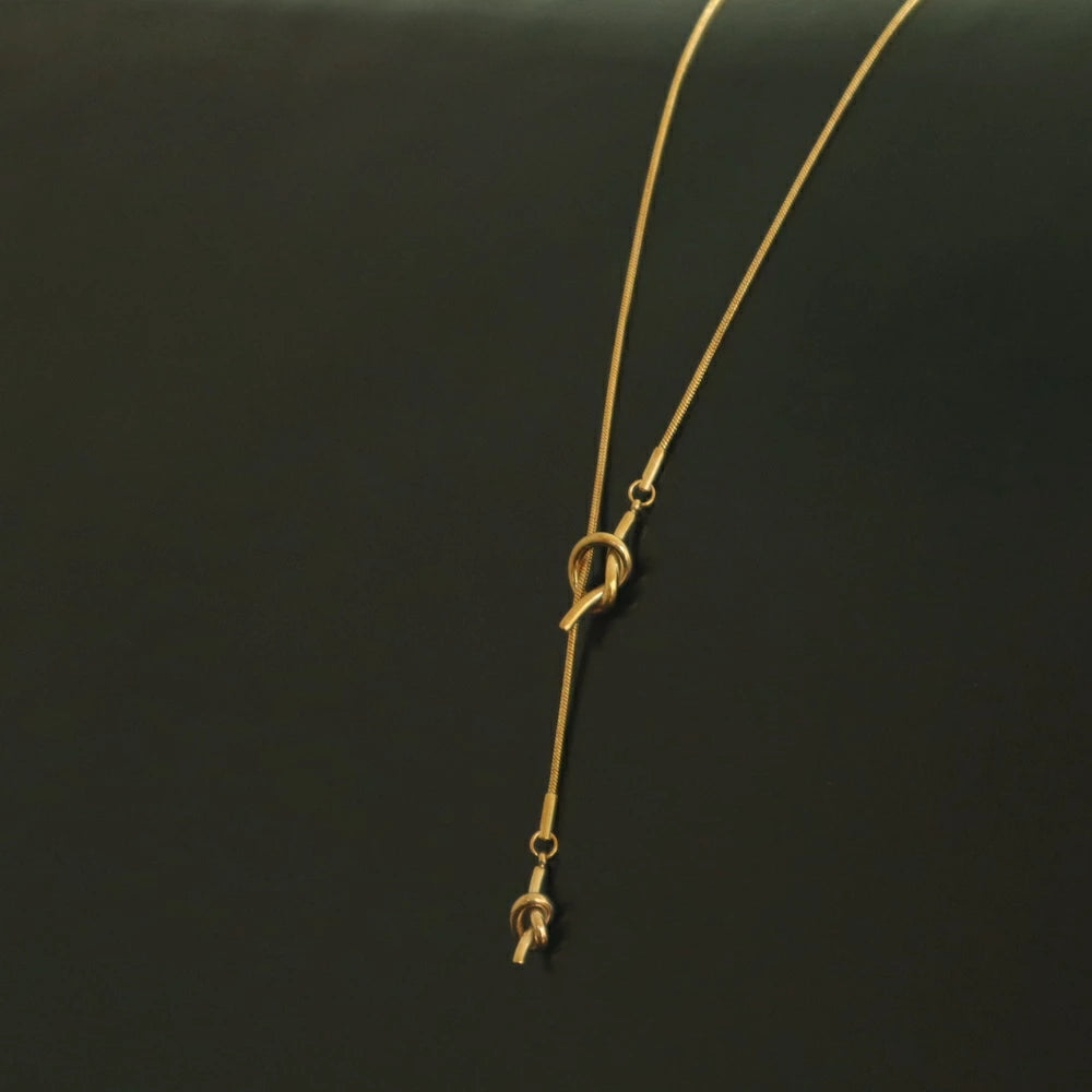N024 stainless knot lariat necklace