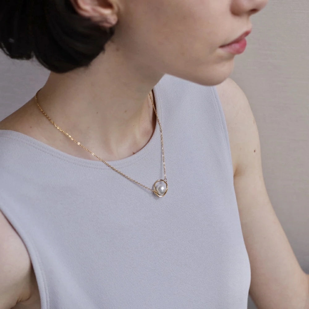 N195  stainless saturn pearl necklace