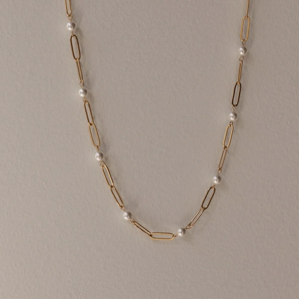 N201  stainless evenly spaced pearl necklace