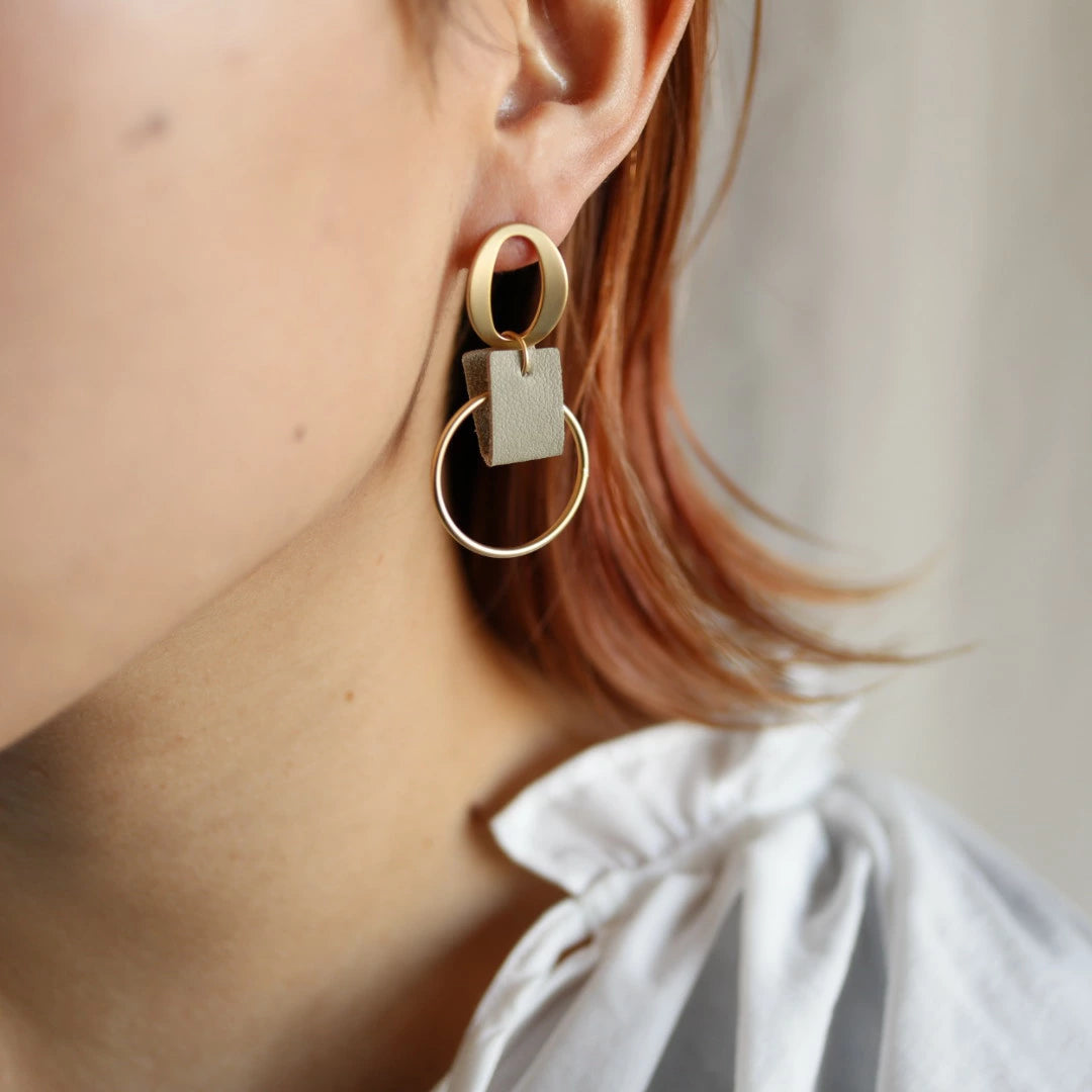 P108  asymmetry faux leather hoop pierce