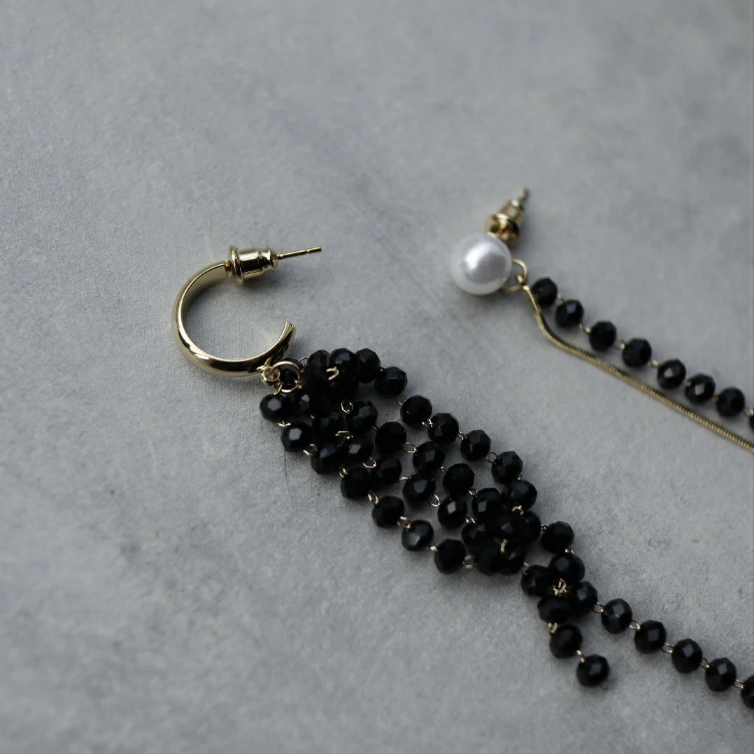 P104  asymmetry beads long pierce