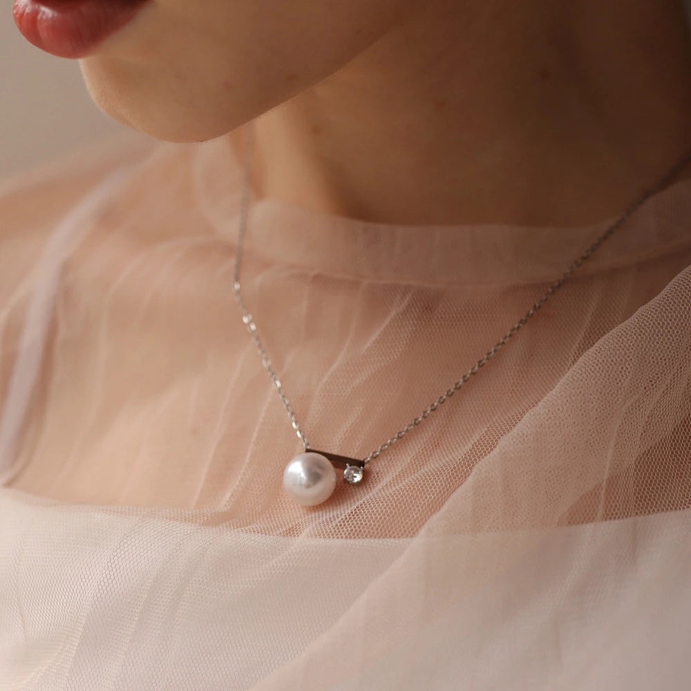 N236  stainless pearl line zirconia necklace