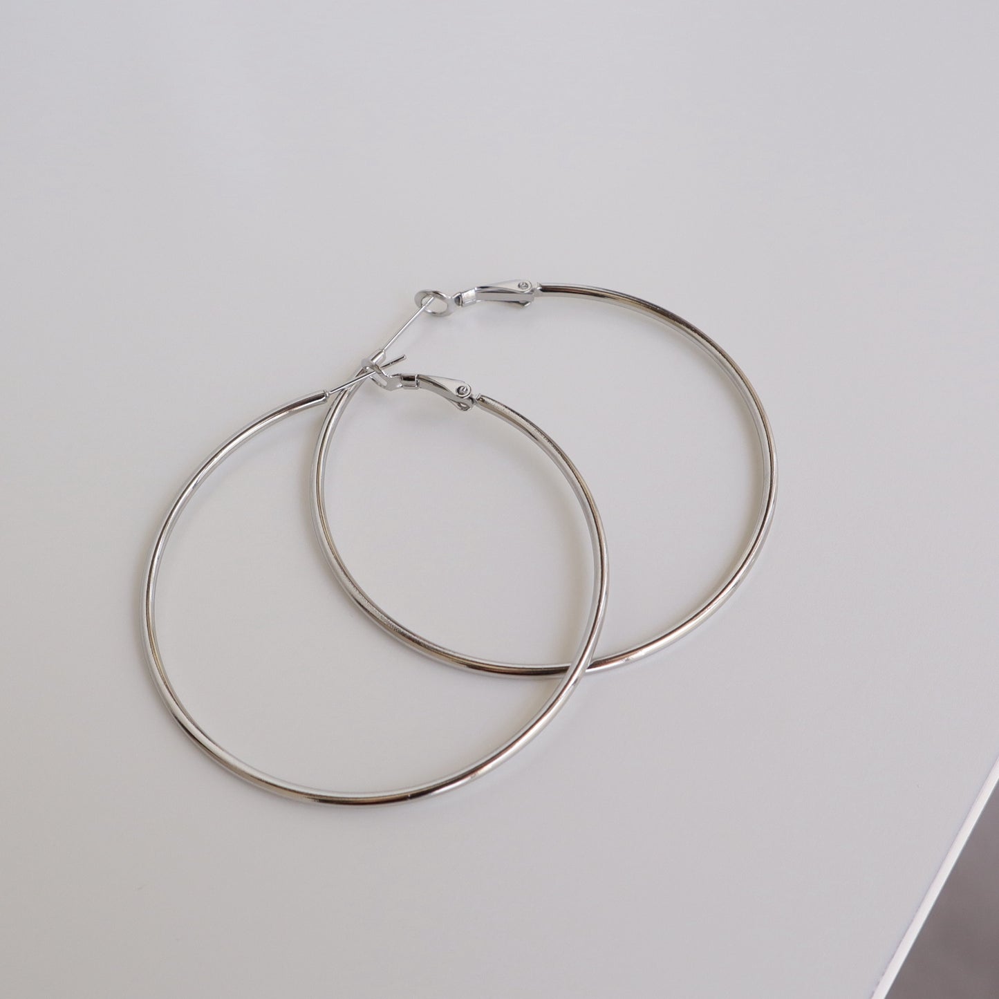P241  stainless oversized hoop pierce