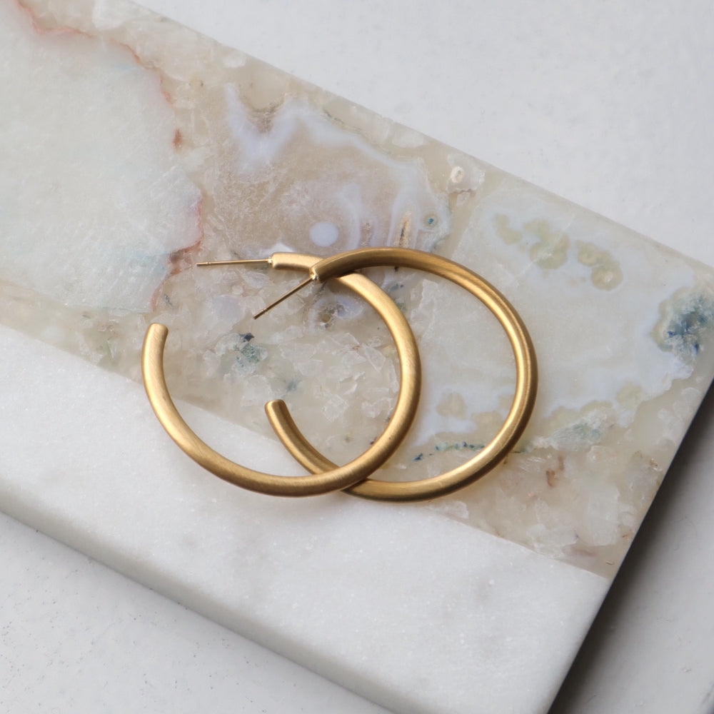 P119  stainless matte gold wave hoop pierce