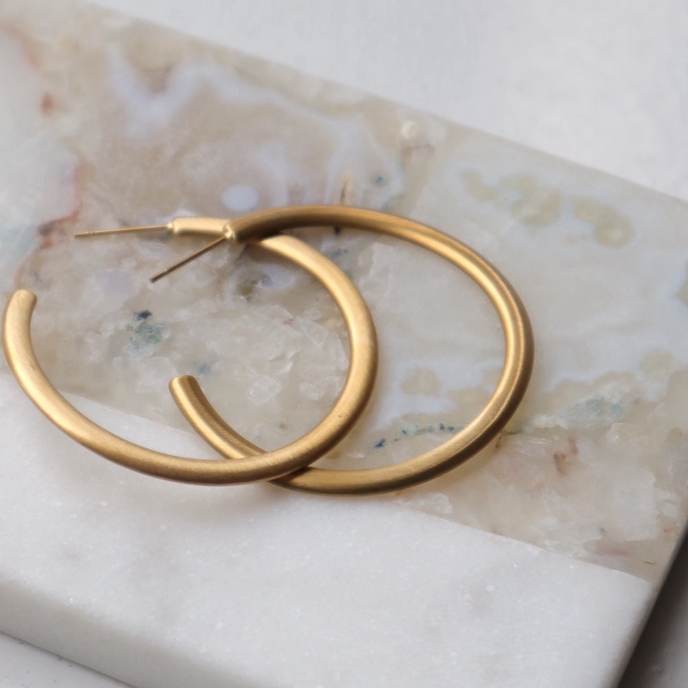 P119  stainless matte gold wave hoop pierce