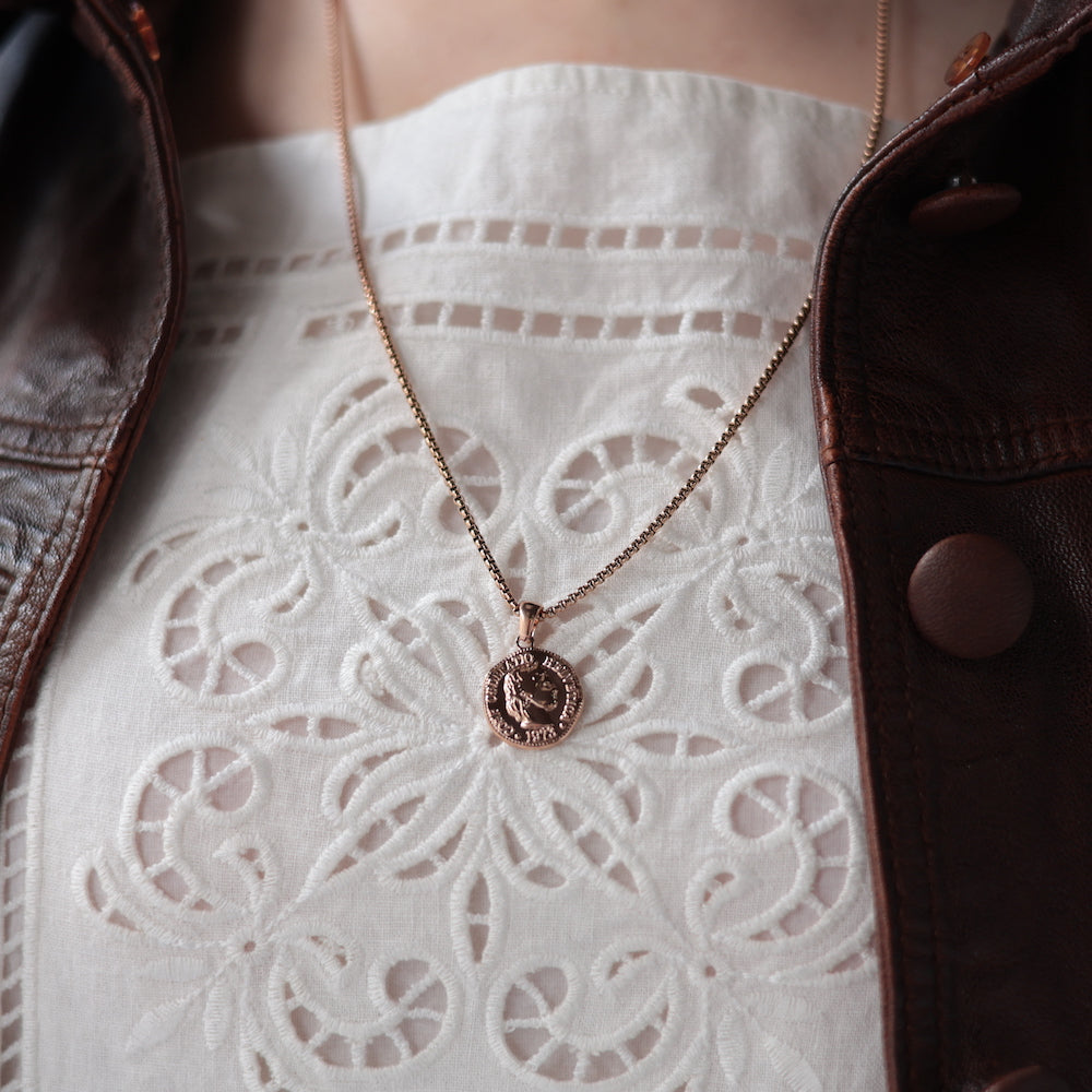 N136 stainless coin pendant