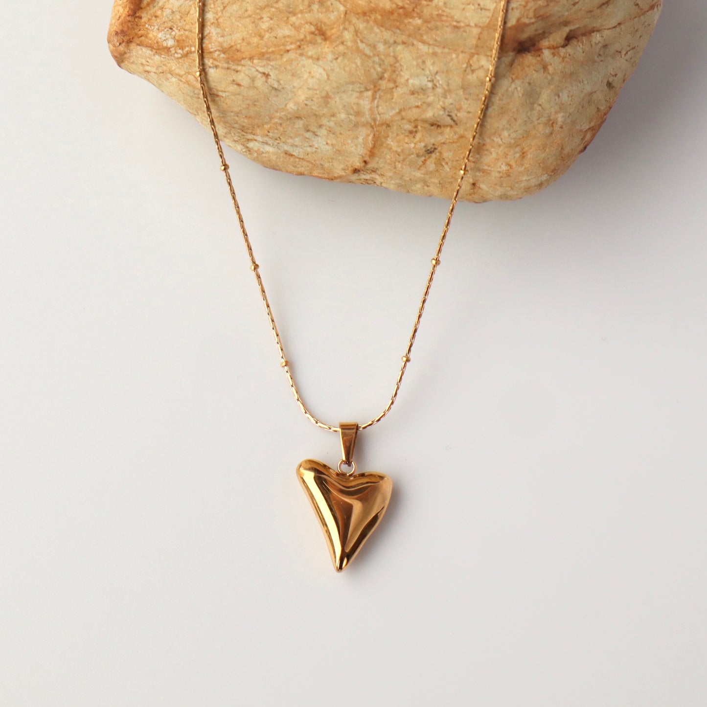 N094  stainless heart motif necklace
