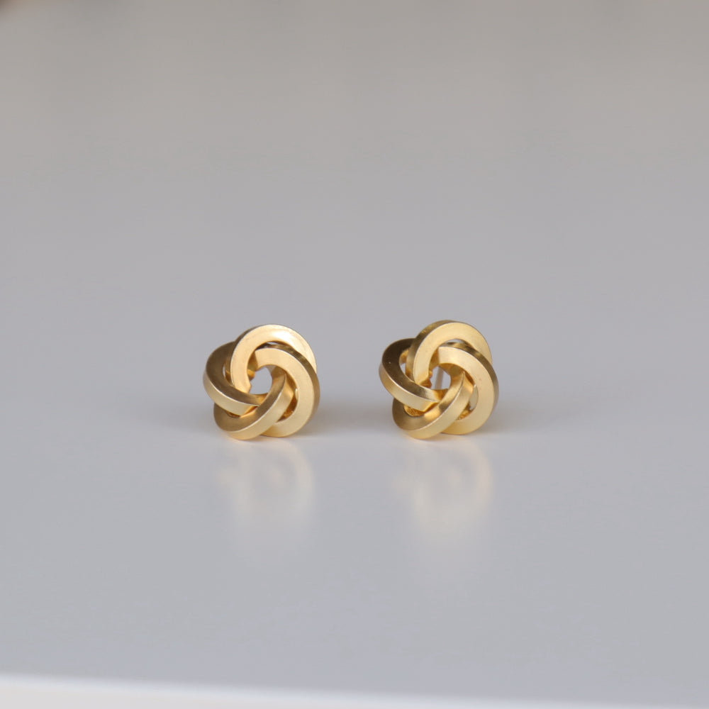 P376  matte gold knot pierce