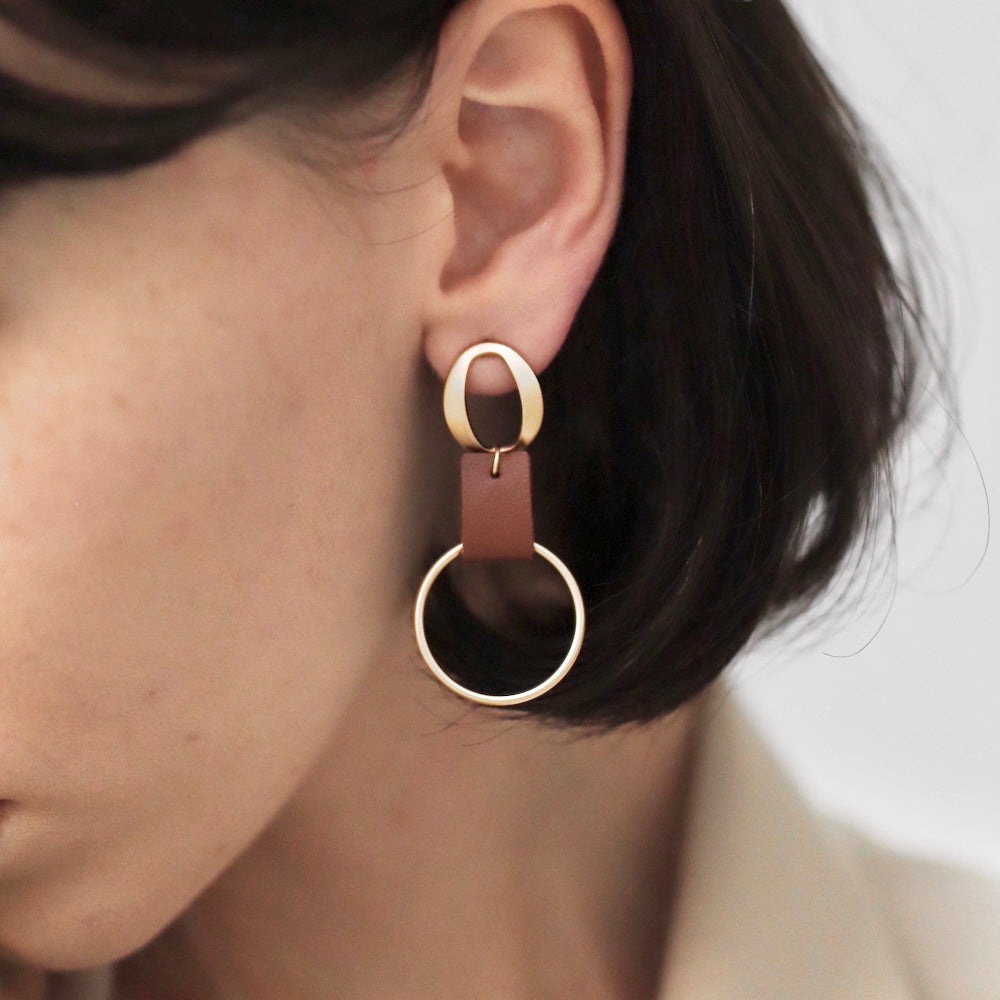 P108  asymmetry faux leather hoop pierce