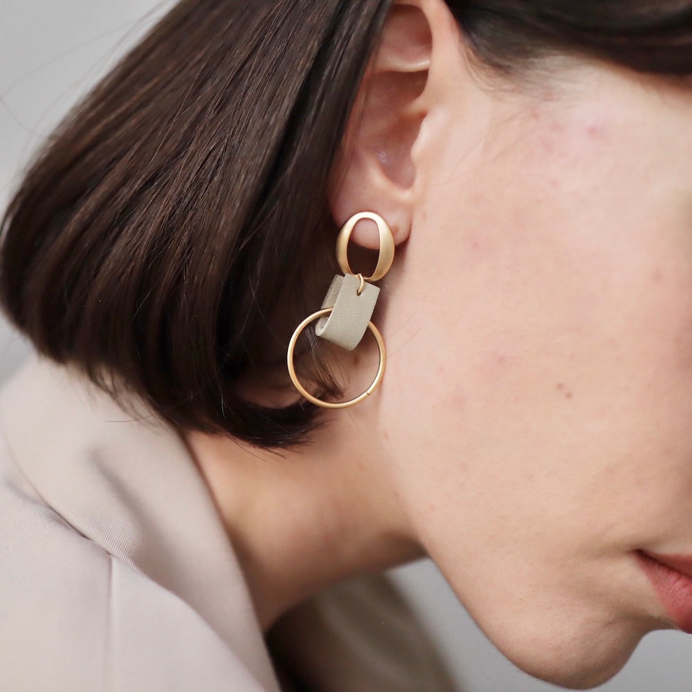 P108  asymmetry faux leather hoop pierce