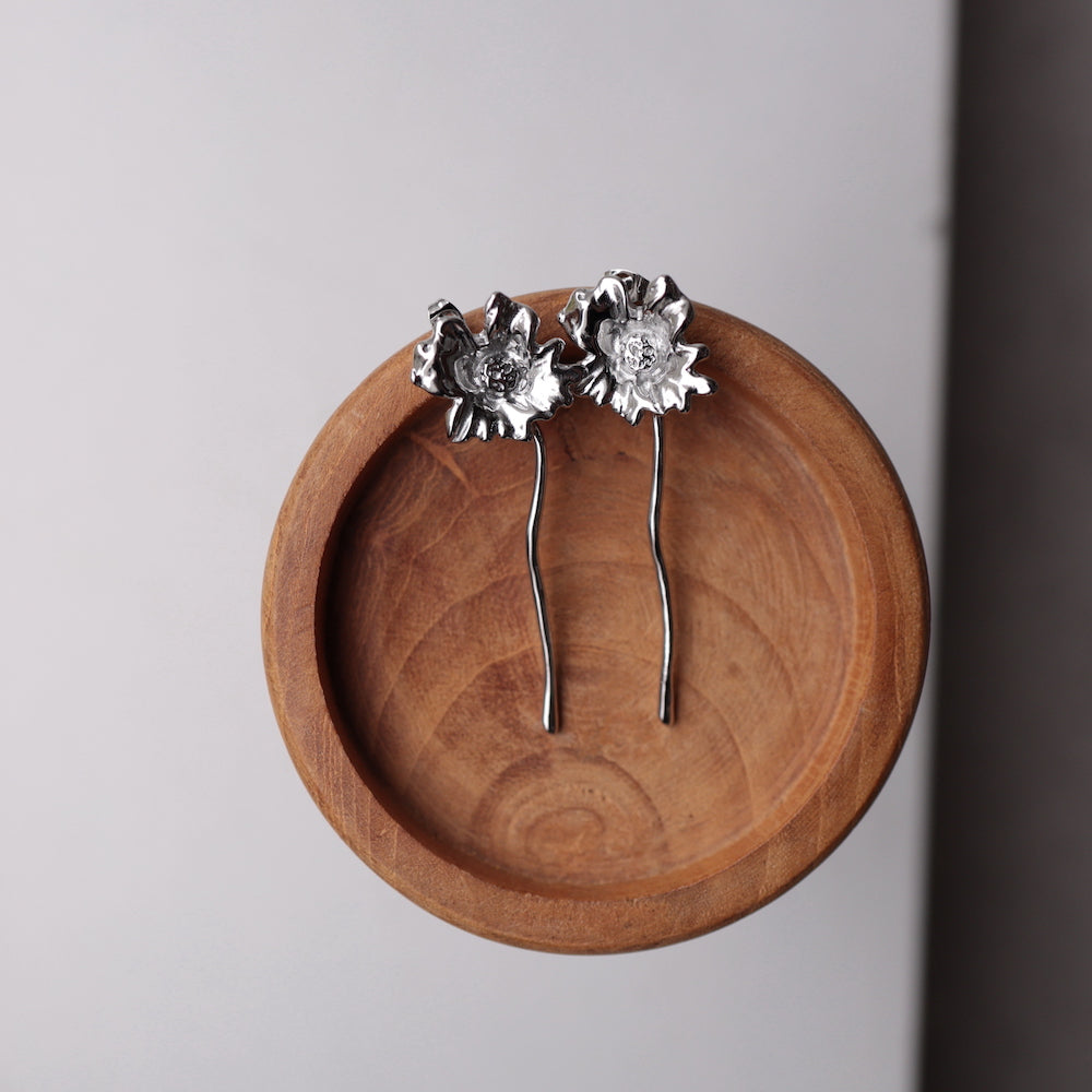 P476 stainless long flower pierce